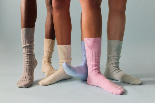 People wearing merino bed socks