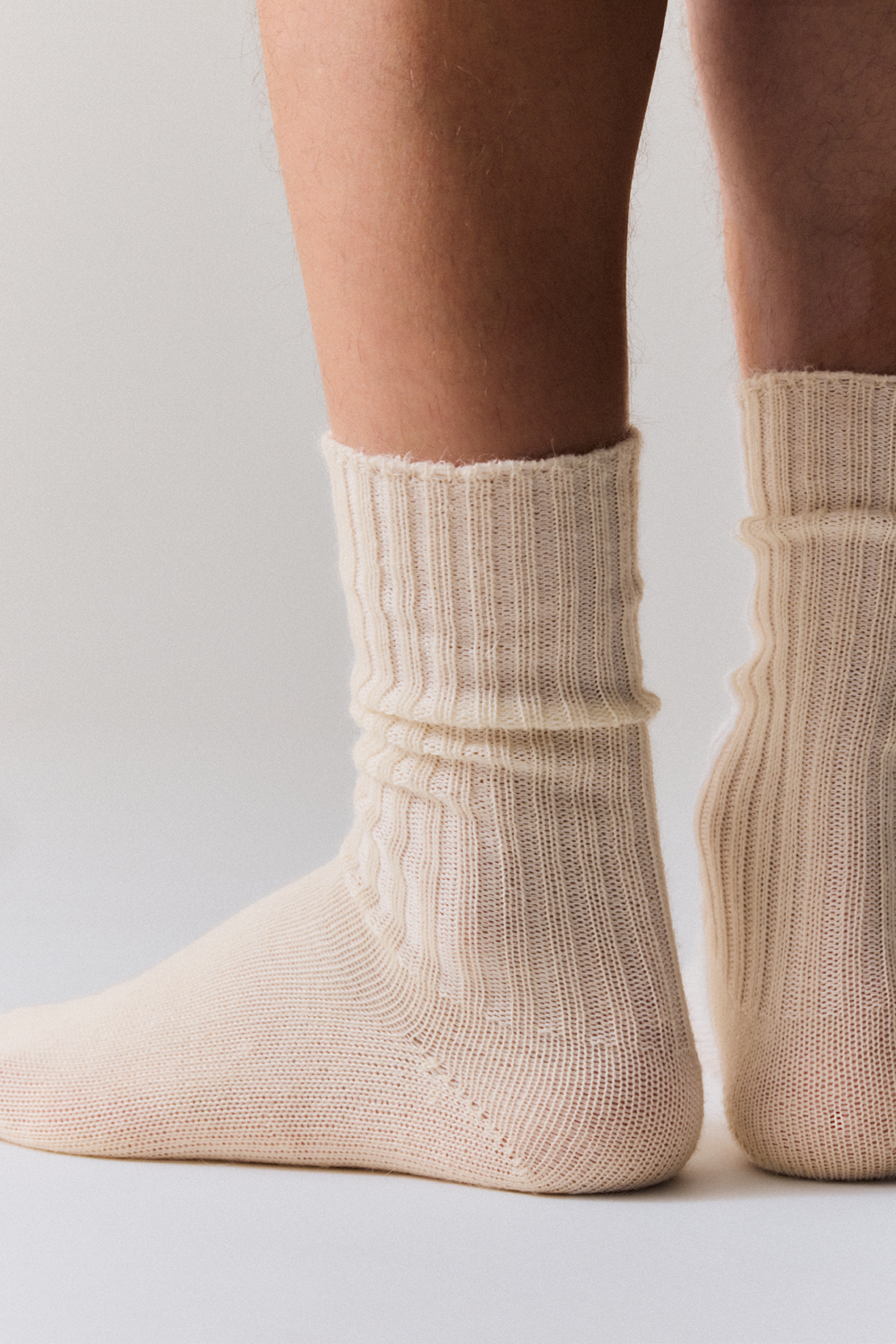 Legs wearing clotted cream mohair socks 