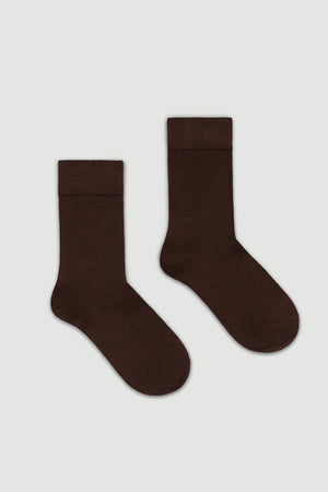 Pair of dark brown bamboo calf length socks on a white background