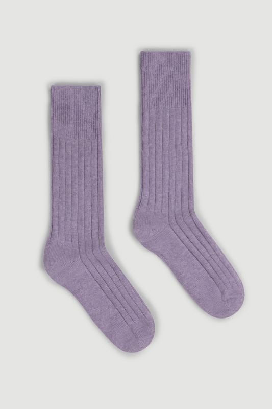Pair of lilac merino ribbed bed socks on a white background