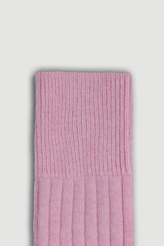 Close-up of the top of a pink merino ribbed bed sock