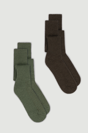 Two pairs of wool knee high socks, one green and one brown, on a white background.